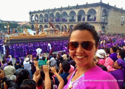 Karina stands tall to see over the crowd, admiring the San Bartolo procession march through the Parque Central. Antigua, Guatemala -- April Beresford