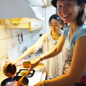 Our couchsurfing host Sharon teaching me how to prepare a delicious Taiwanese meal. I didn't burn a thing ! Taipei, Taiwan- Karina Noriega